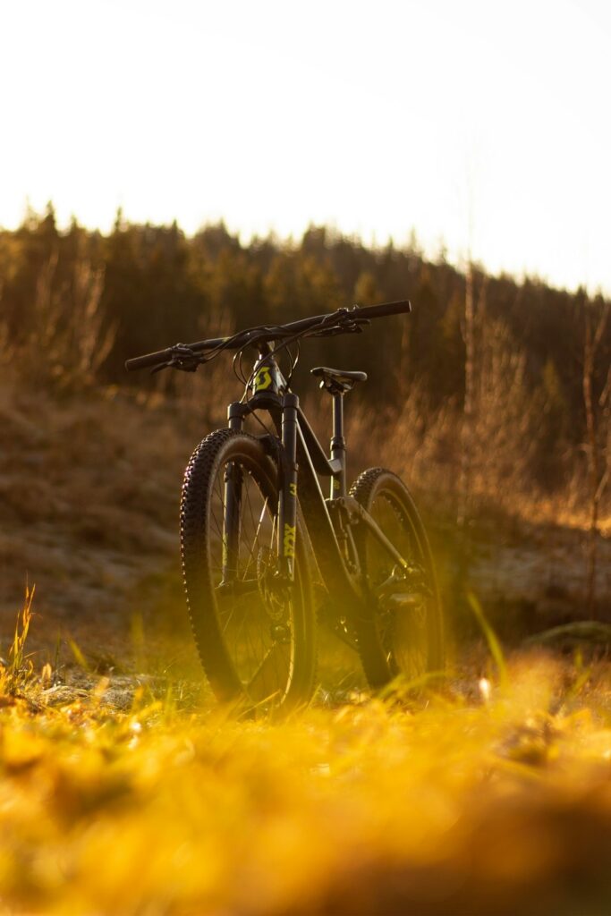 parked hiking bike on grass during day